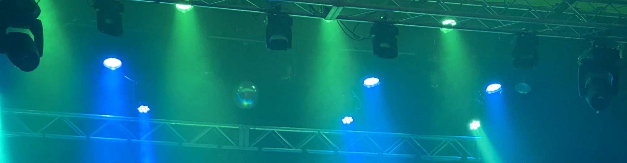 blue and green theater stage lights Lexington